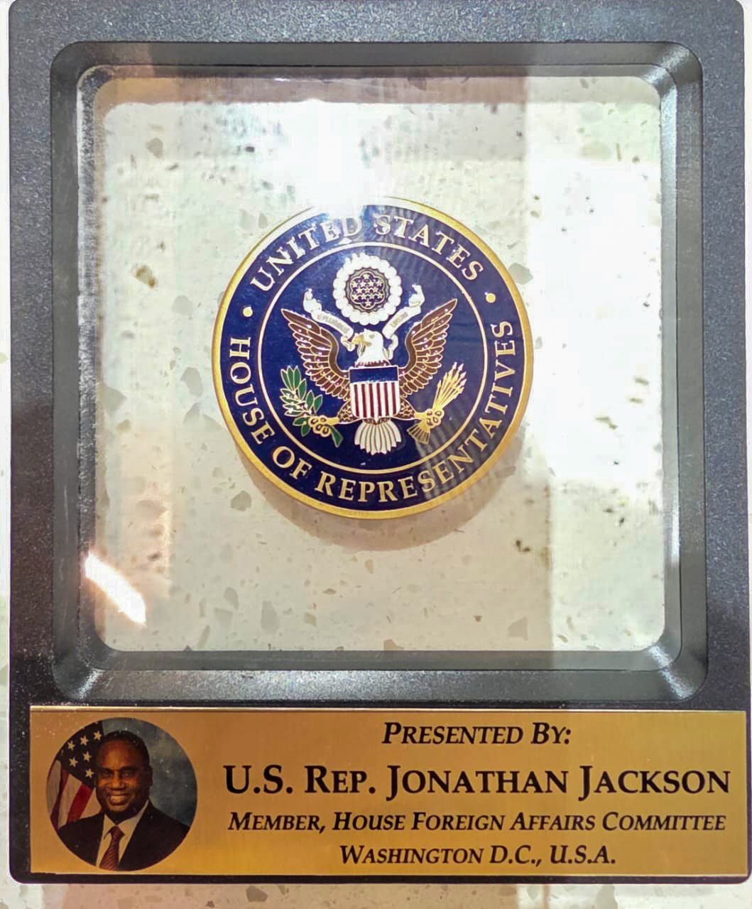 A U.S. House of Representatives commemorative memento presented to Dr. Nawab Mir Nasir Ali Khan by U.S. Representative Jonathan Jackson.